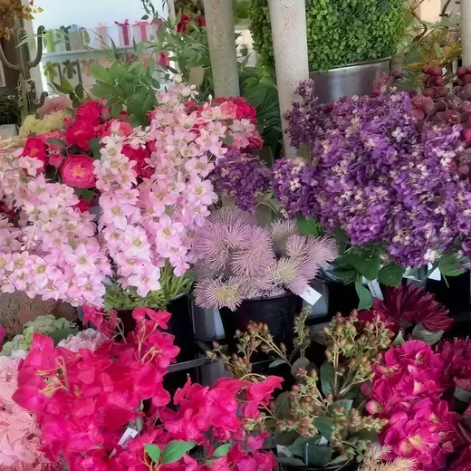 Pink and purple stems in the floral corner