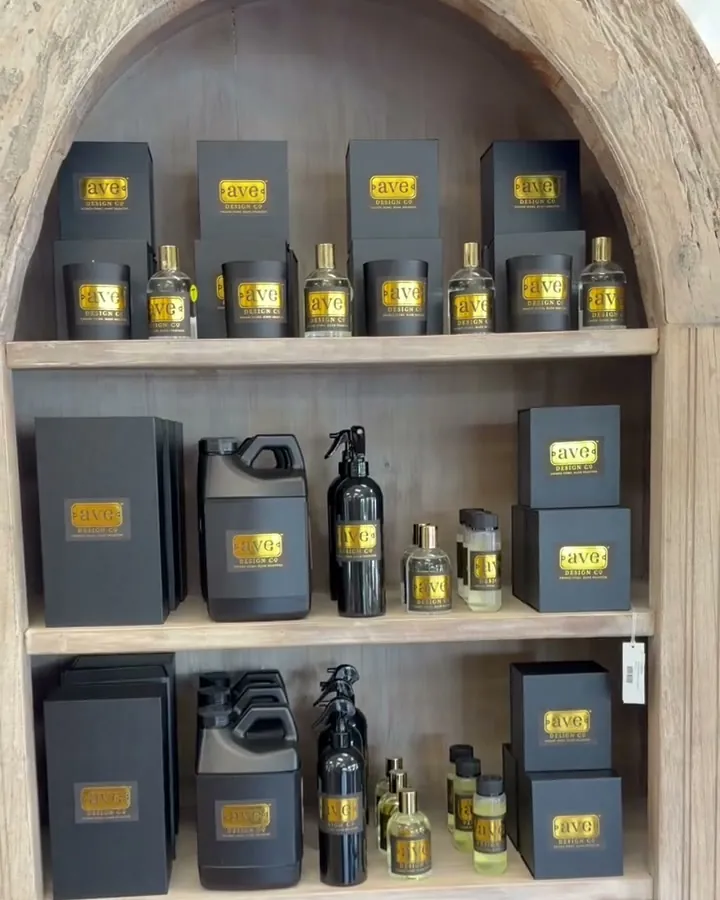 The ave line of home fragrance in an arched shelf